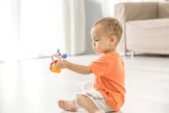 Tolo Mausrassel -Spielzeug Förderung tolo classic muis rammelaar 1